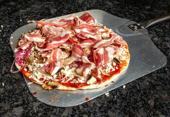 Gourmet Pizza Ready for Oven - Savory Delights Await