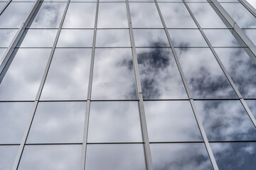 Cloudy Sky Reflection on Skyscraper Buildings Background Textures
