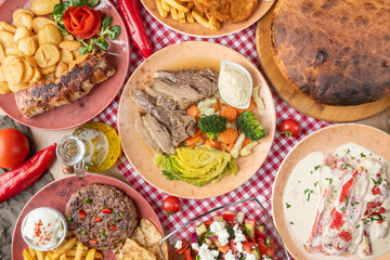 Table Full of Food: An image capturing a bountiful spread of various dishes arranged on a table, showcasing a diverse assortment of cuisines and flavors, ideal for feasts or banquets.