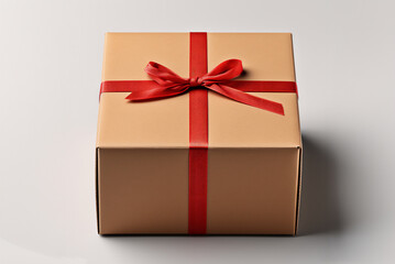 Gift beige box with red bow for parcel on white background