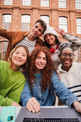 Vertical portrait of a group of friends having fun and smiling together. High school students looking at camera with happy expression. Young friendly real people staring front posing for a photo - obrazy, fototapety, plakaty