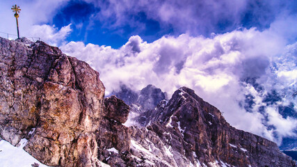 Clouds rise over the summit of The Zugspitze,2962 m above sea level,the highest peak in Germany,...