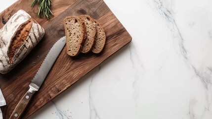   Two loaves of bread on separate cutting boards with a knife nearby - obrazy, fototapety, plakaty