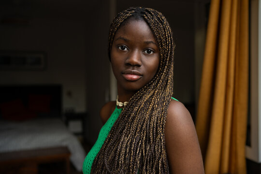 Serene African American woman at home setting
