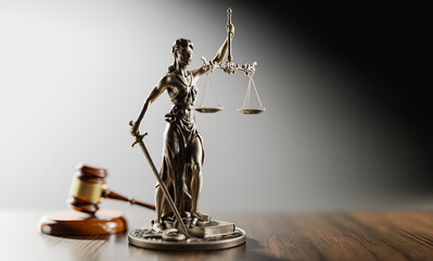 Legal Concept: Themis is the goddess of justice and the judge's gavel hammer as a symbol of law and order