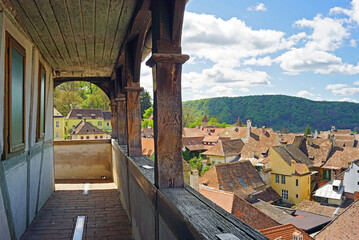 Landscape from the top level of the Clock Tower in the Romanian city of Sighisoara: a fragment of...