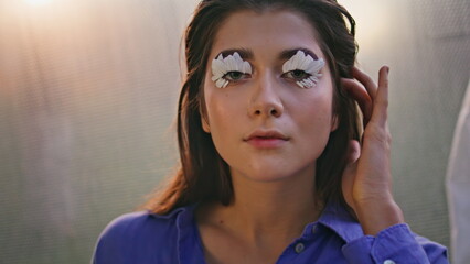 Portrait woman creative eyelashes closeup. Unique makeup style on model face