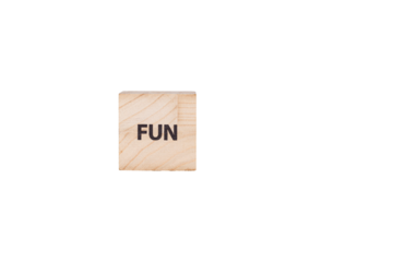 wooden cubes with the inscription Fun on a white isolated background close-up