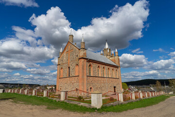 Fototapeta na wymiar Old ancient catholic church of St Michael in Gnezno, Grodno region, Belarus.
