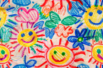 Hand-drawn children's artwork with happy suns and flowers