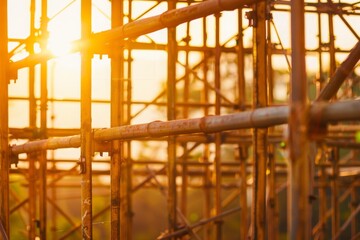 Golden Hour at the Construction Site: Sunlight Pierces Through the Framework of Scaffolding, Highlighting the Progress of Urban Architecture, Generative AI