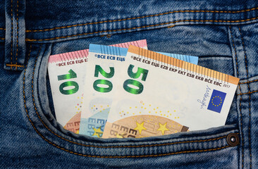 Euro banknotes in a pocket of a jeans 1