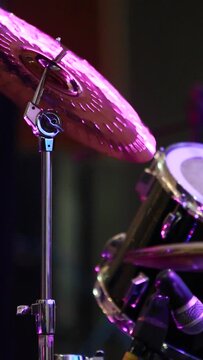 vertical video, close up cymbal, drummer playing hard heavy rock. Drum set, rhythm concept