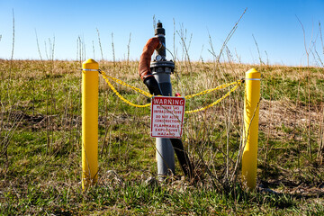 Landfill methane gas vent on site of old dump