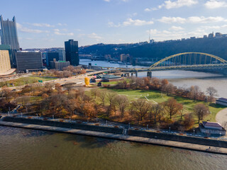 Aerial landscape of bridge and skyline and river during fall in Pittsburgh Pennsylvania
