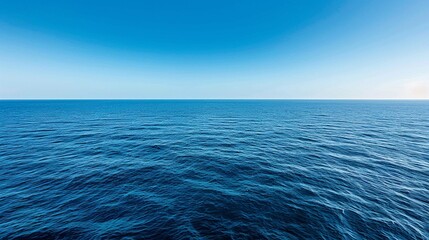 vast open sea against a backdrop of clear blue sky