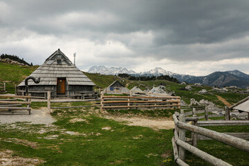 Alpine village in spring high in the mountains