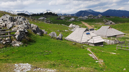 Alpine village in spring high in the mountains