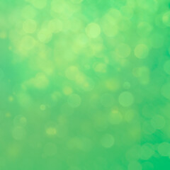 Obraz premium Green bokeh square background for Banner, Poster, ad, celebration, event and various design works