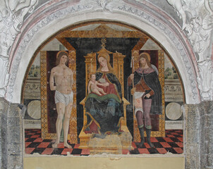 Madonna in trono con Bambino tra i Santi Rocco e SEbastiano; affresco nella chiesa romanica di San...