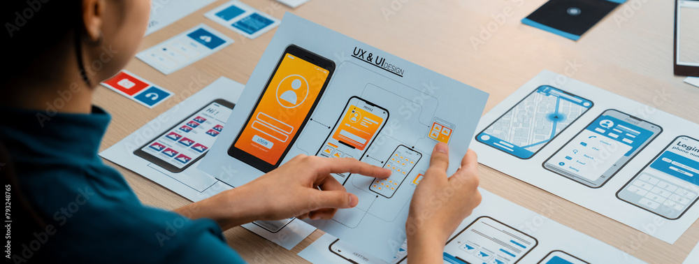 Poster panorama banner of startup company employee planning on user interface prototype for mobile applicat