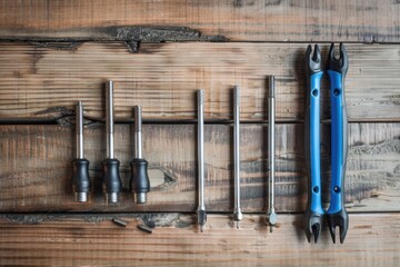 Various tools on a wooden table, suitable for DIY projects - Powered by Adobe