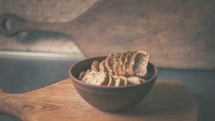 Baked rye crackers in a clay plate