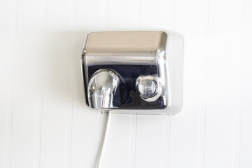 hand dryer in the toilet room. Modern Design Trends