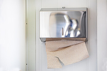 paper napkins for hands and face in the toilet room