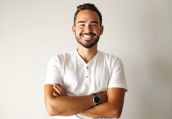Photo of happy man wearing casual , standing with his arms crossed and smiling to the camera isolated on white background