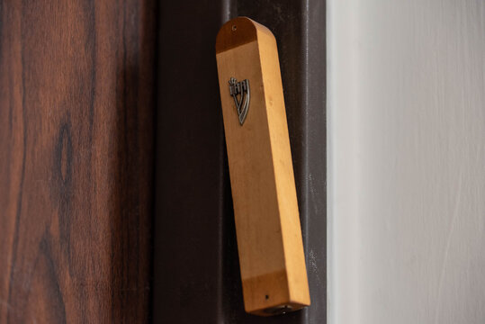 Jewish mezuzah on the doorpost, a prayer for home protection in Judaism. Modern mezuzah in Israel.