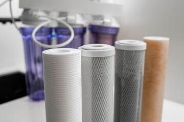 Filters for reverse osmosis on the table for water purification in the modern kitchen. 