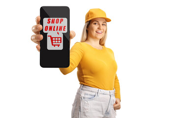 Young female holding a smartphone with text shop online