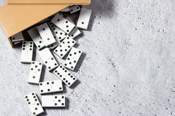 Strategy and fun; classic domino game. Copy-space.