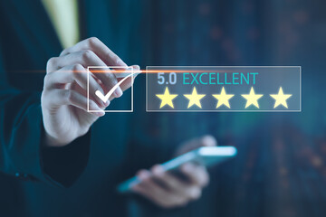 Businessman using smartphone give rating to service experience on online application, 5-star...
