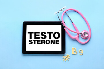 Stethoscope and text B9 made of folic acid pills on color background