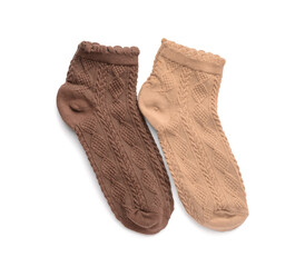 Different basic color socks on white background
