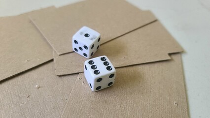 Two 6-sided dice on a table: symbol of chance and luck