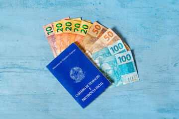 Brazilian work card. Registered work CLT and money from Brazil. Minimum wage Brazilian real money.