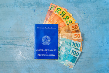 Brazilian work card. Registered work CLT and money from Brazil. Minimum wage Brazilian real money.