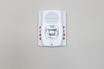 Fire alarm system with strobe. Fire alarm sensor mounted on the wall
