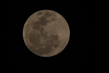 The full moon is a lunar phase that occurs when the Moon is completely illuminated as seen from Earth. This happens when the Earth is directly between the Sun and the Moon