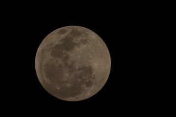 The full moon is a lunar phase that occurs when the Moon is completely illuminated as seen from Earth. This happens when the Earth is directly between the Sun and the Moon