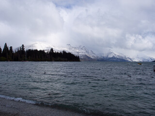 Lake Wakatipu And Snow Covered Mountains
