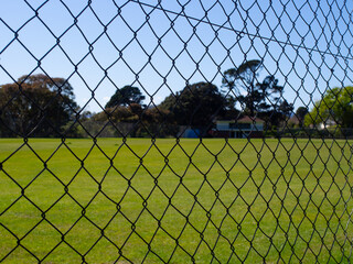 Sports Field Behind A Wire Fence