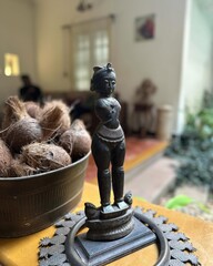 Coconut figurine in the interior of a coffee shop.