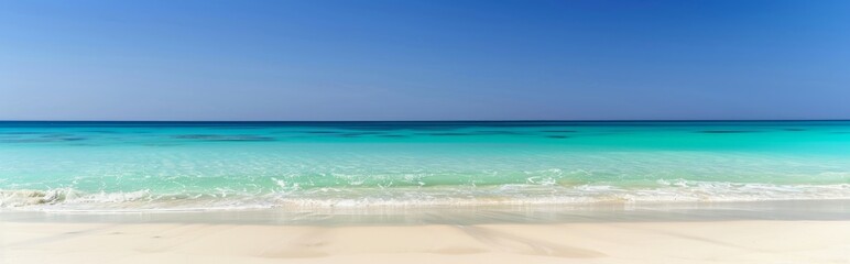 Obraz premium sandy beach against the backdrop of the blue sea