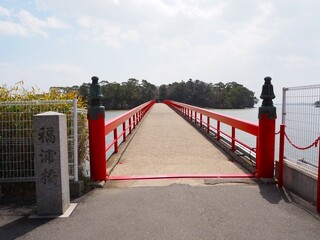 Fukuura island accessible via a long red bridge in matsushima bay