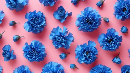 A stunning array of vibrant blue carnations in full bloom against a vibrant pink backdrop creating a beautiful design concept for Mother s Day appreciation The image captures the essence of