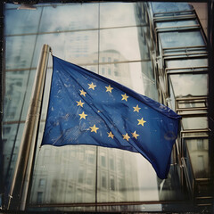 European union flag, building in the background, daylight